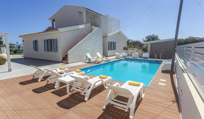 The villa offers a spacious, sea facing terrace ideal for taking in the stunning views