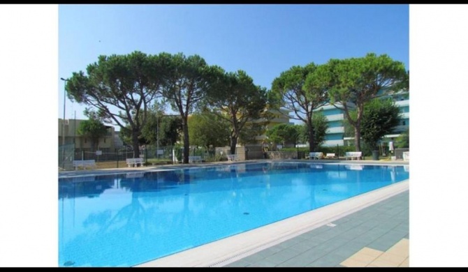 Apartment in Great Resort with 12 swimming pools, tennis -volleyball - kids area